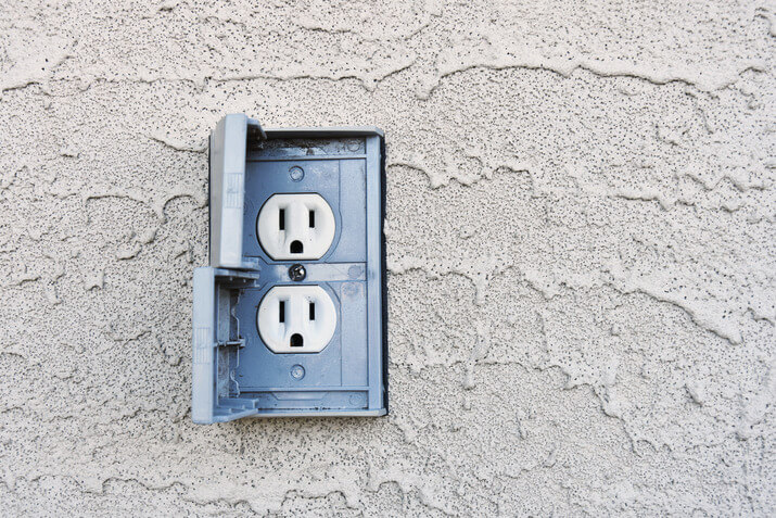 Outdoor electrical outlets with gray protective cover